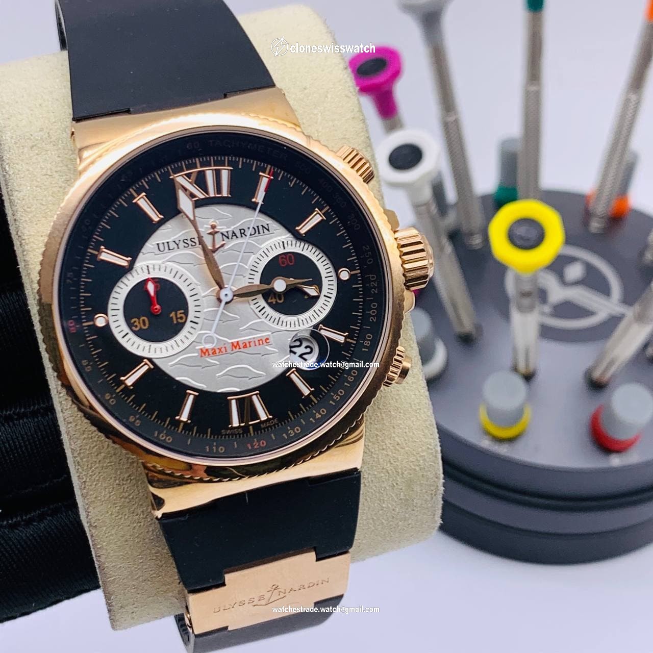 UN Maxi Marine Black/White Dial Gold Case on Black Rubber Strap UN Maxi Marine Black/White Dial Gold Case on Black Rubber Strap